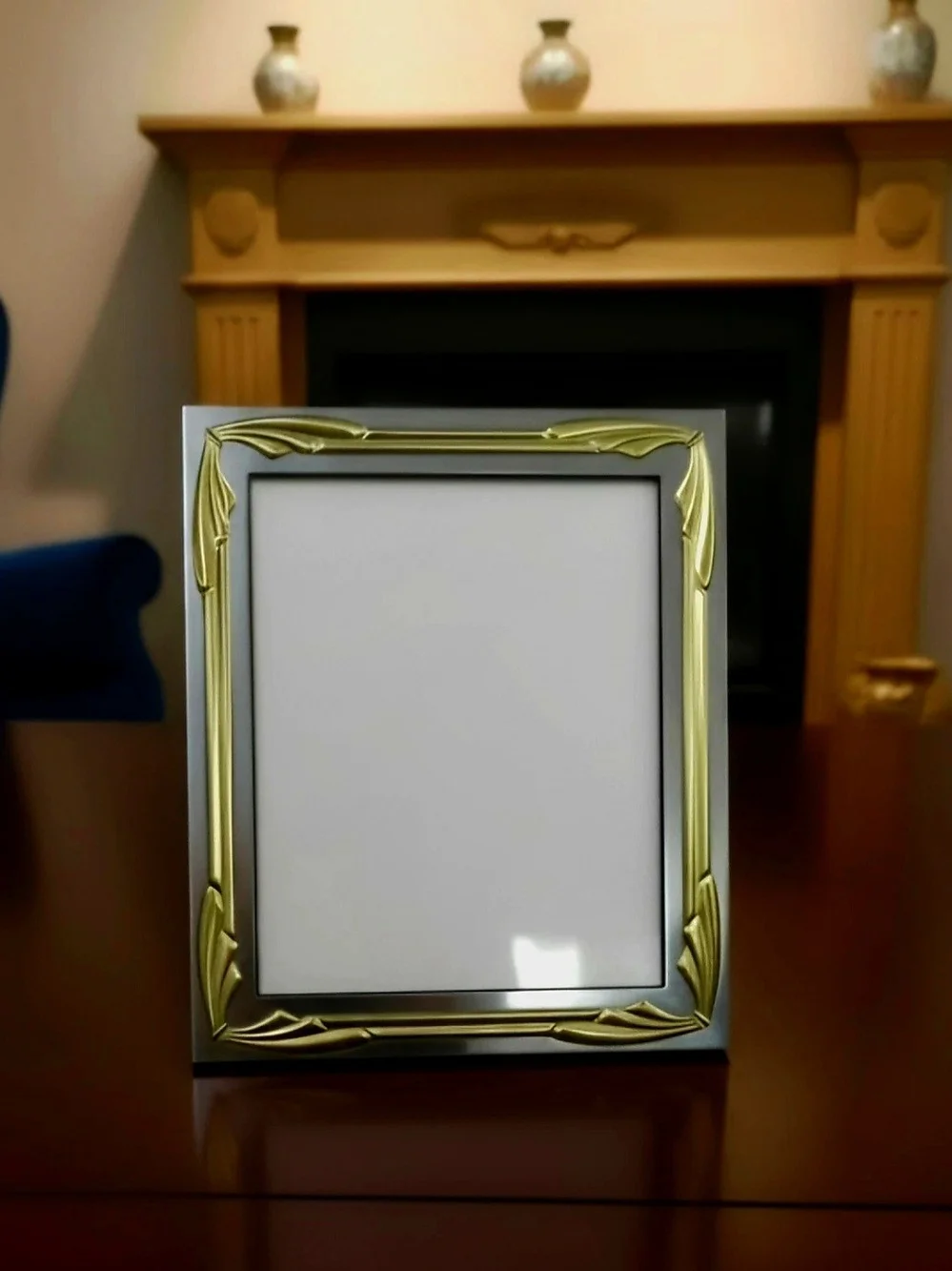 Mid Century Picture Frame Featuring Silver Mirroed Finish With Ornate Gold Tones